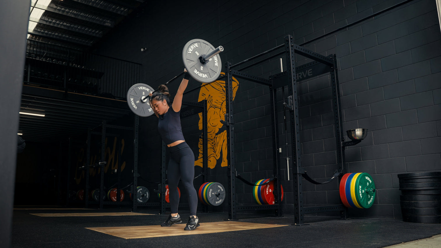 A commercial strength and conditioning gym fitted out by VERVE, racks and platforms in a bright warehouse space