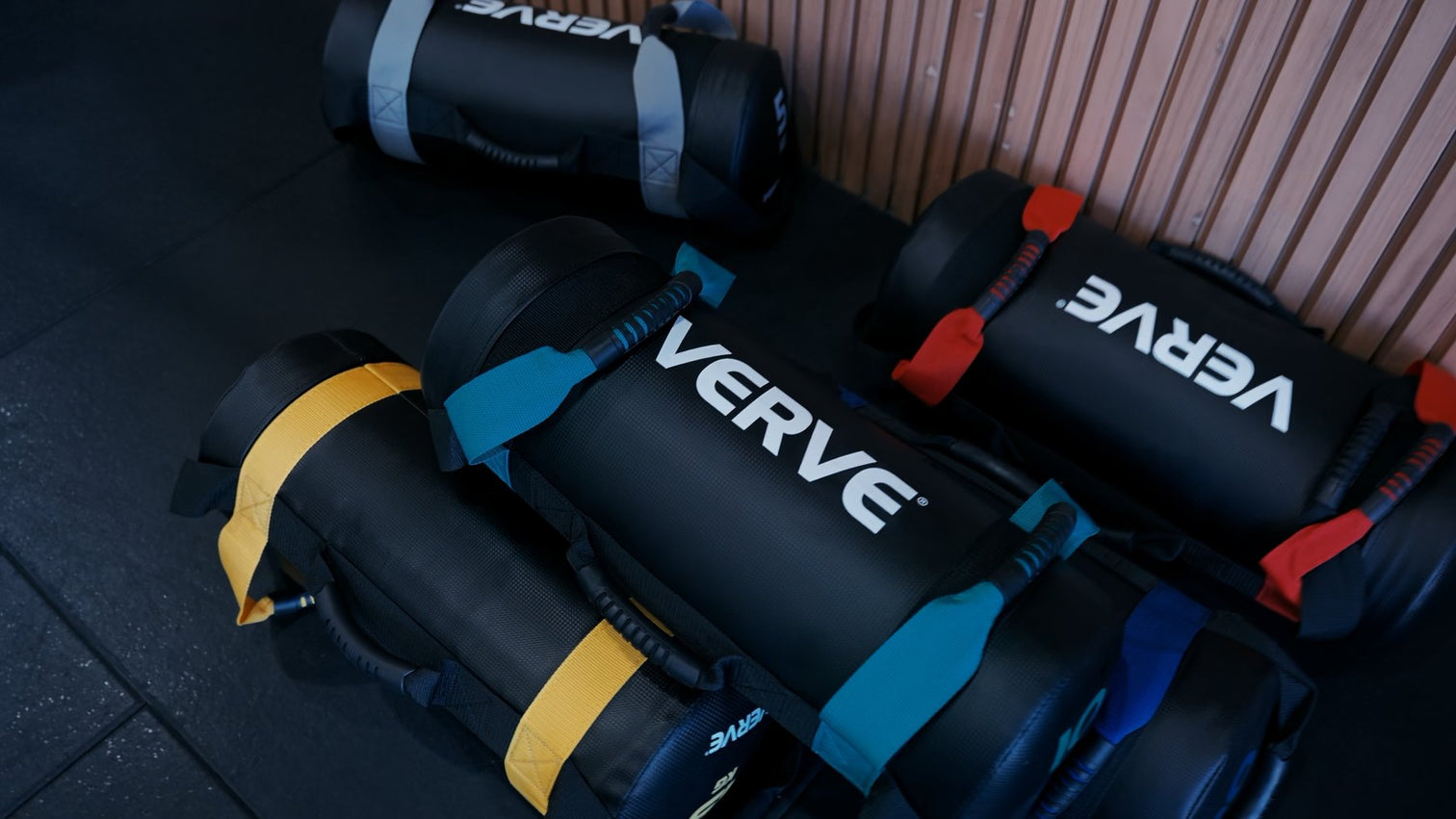 VERVE sandbags and accessories on a commercial gym floor