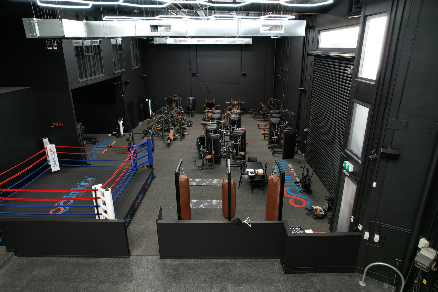 Wide view of a large commercial gym floor fitted out by VERVE