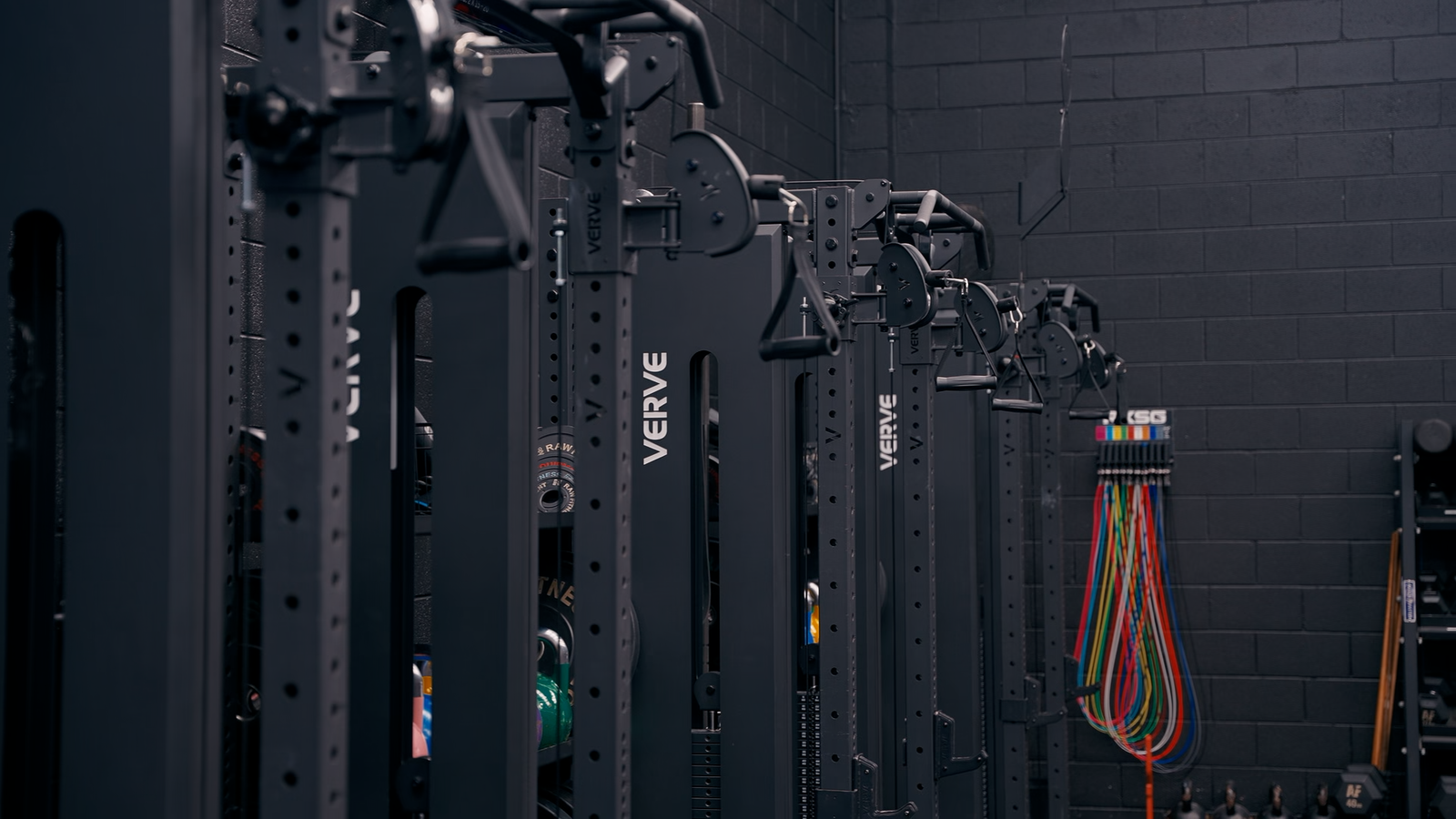 Finished commercial gym fit-out with strength equipment and turf strip delivered by VERVE