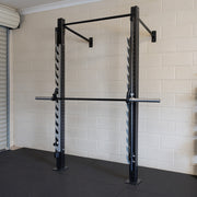 VERVE Wall Mounted Smith Machine fixed to the wall of a home garage gym