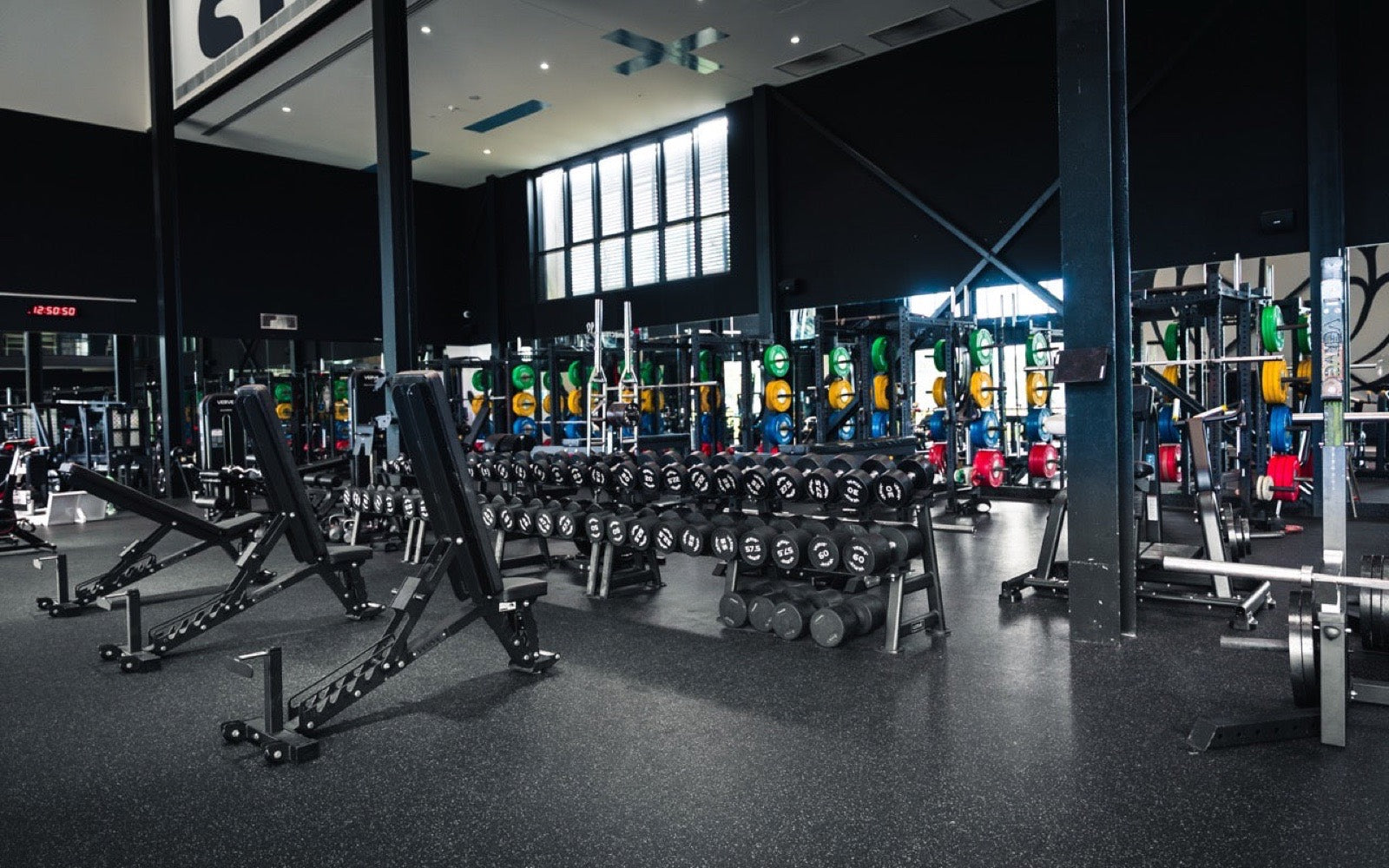 The NSW Waratahs training floor with rows of racks and benches